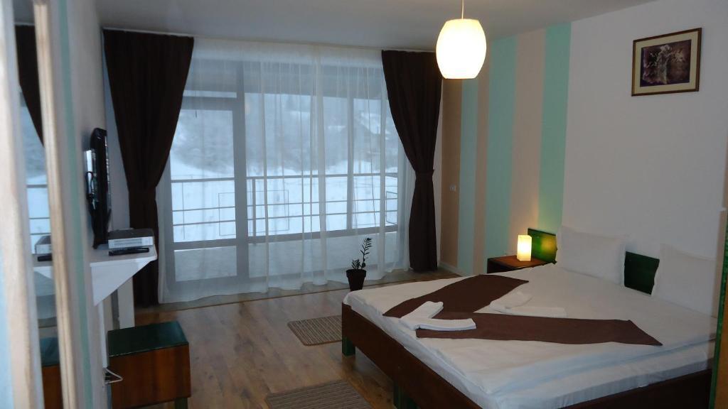 Ezio House Hotell Timisu de Jos Rum bild